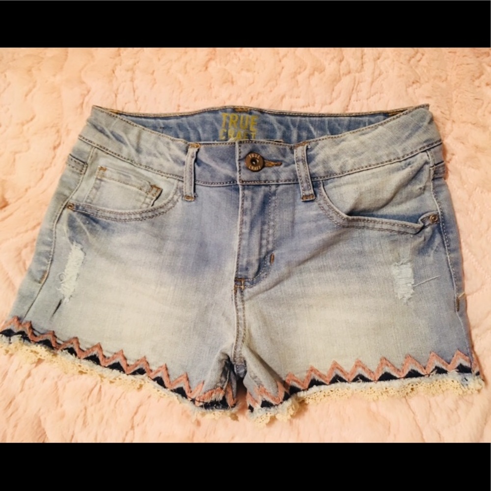 New shorts with rose, navy, and lace embroidery